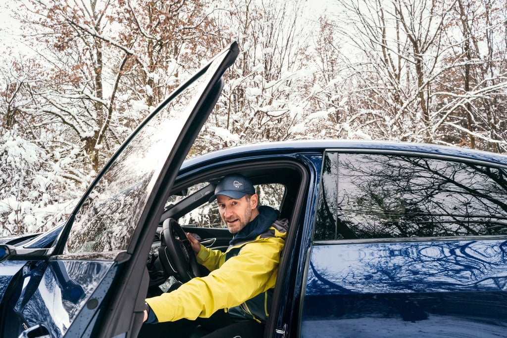 Portrait of Sebastian Copeland in his Audi e-tron.
