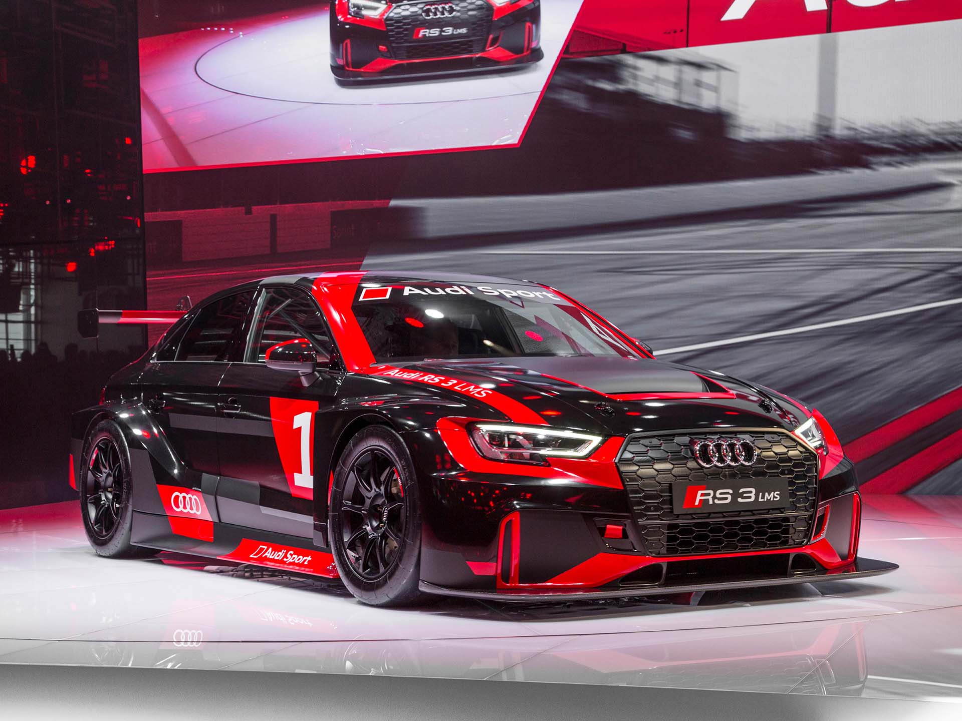 A picture showing the reveal of the Audi RS 3 LMS at the 2016 Paris Motor Show.