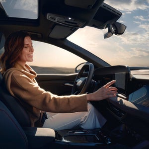 Woman using Audi Connect