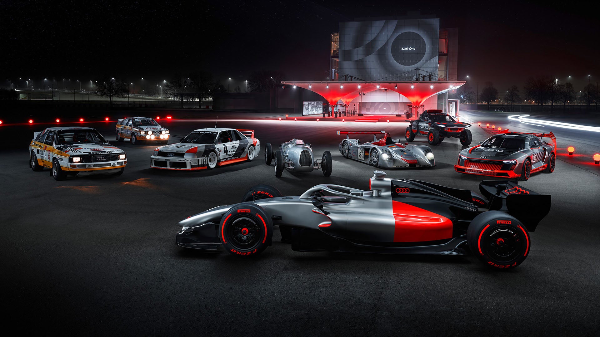 A picture showing Audi race cars on display.