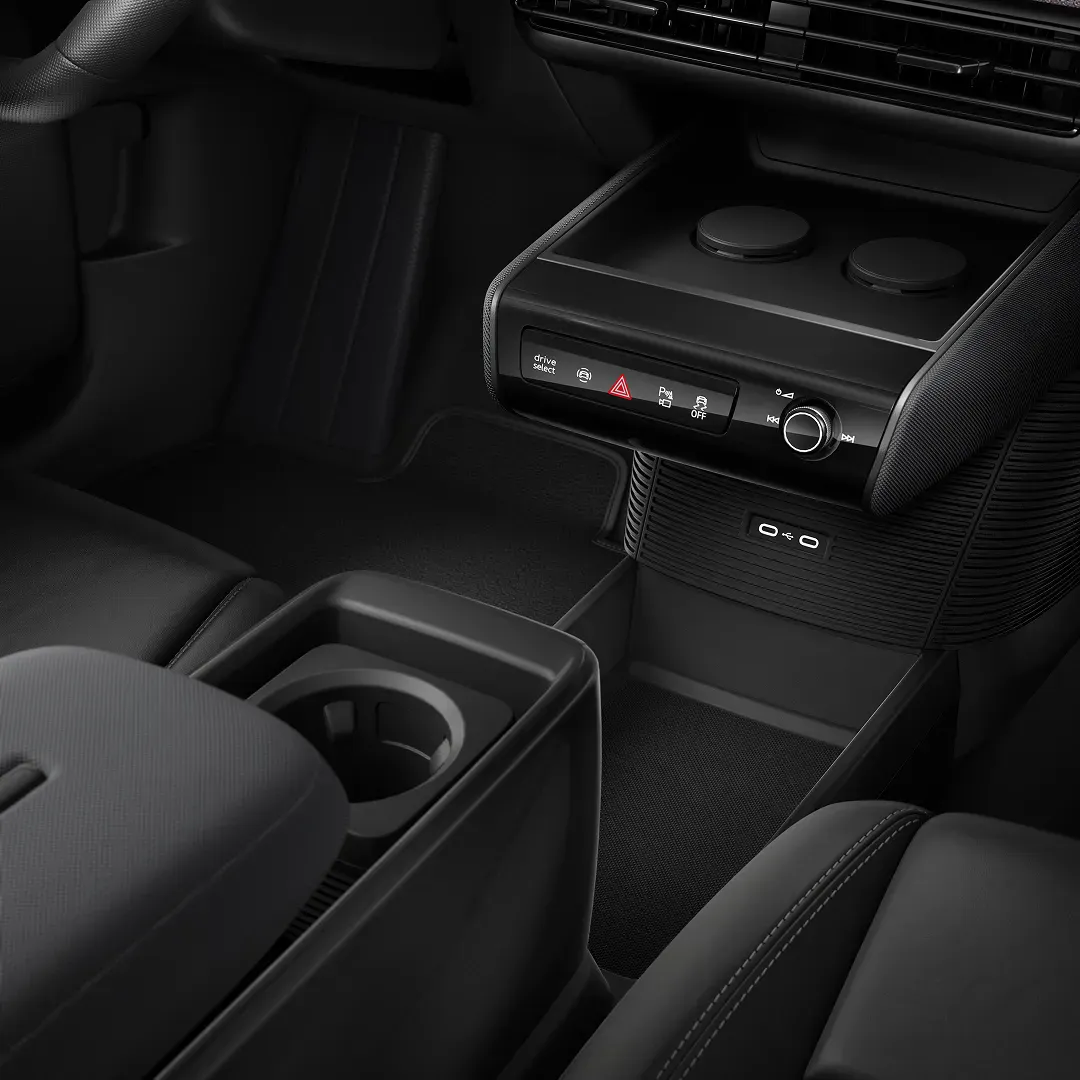 Black interior console and dashboard controls inside the Audi A2 e-tron