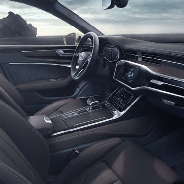 Foto del interior de un Audi A6 allroad quattro en la que se muestra el MMI touch response. 