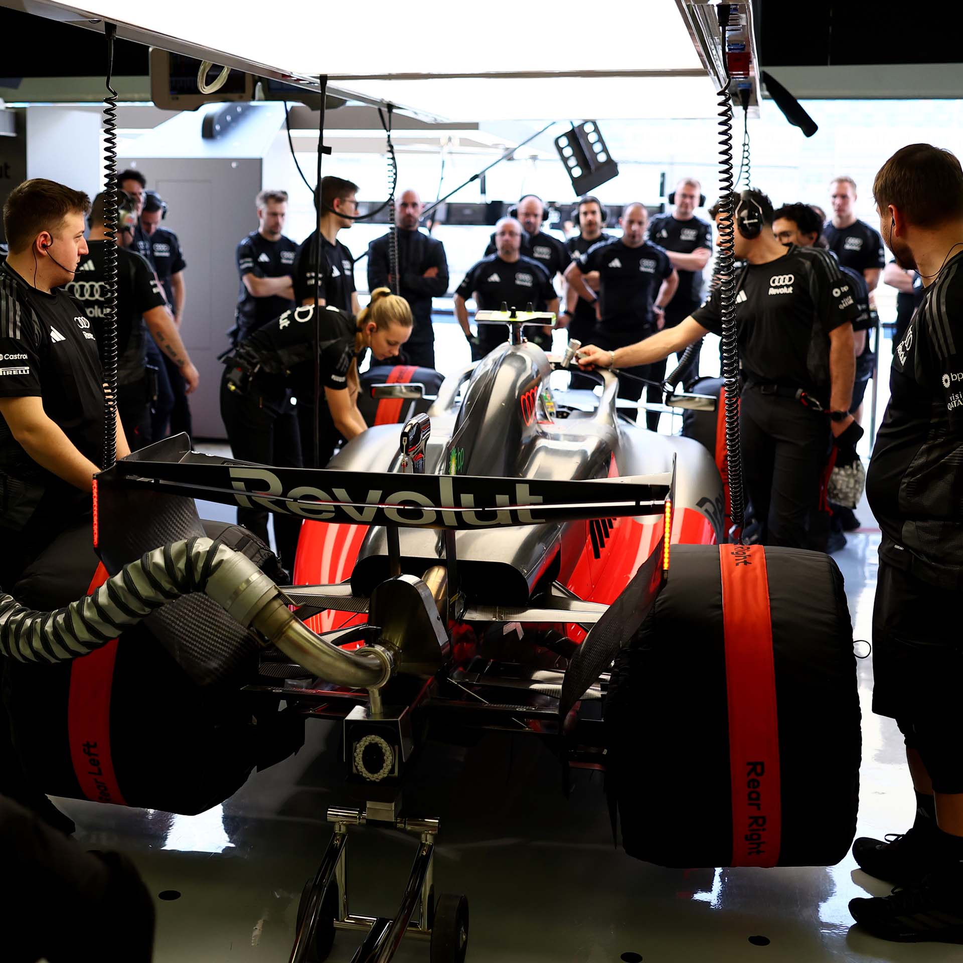 A picture showing the Audi R26 stationary in pitlane.