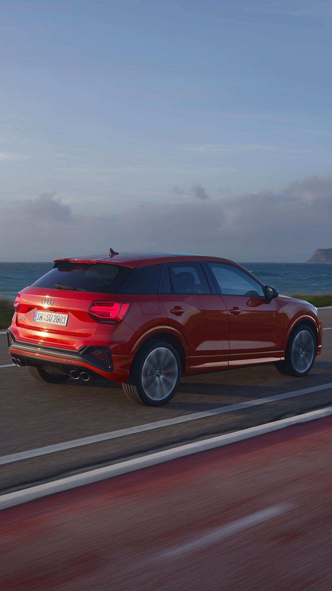 Red Audi SQ2 in motion