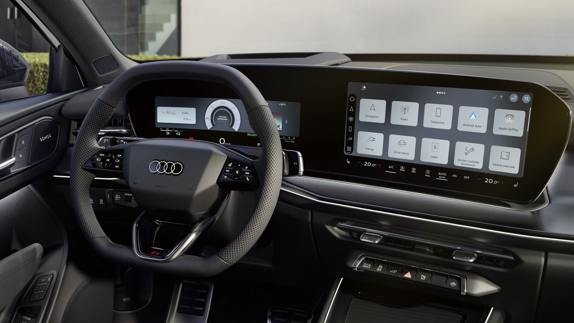 The cockpit of the Q3 SUV e-hybrid with a focus on the driver's instrument panel and the panoramic display.