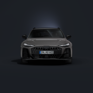 Der Audi A6 allroad frontal von vorn auf dunklem Hintergrund.
