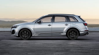 Audi Q7 with dusky countryside back ground