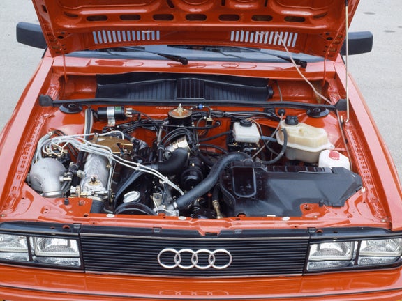 Interior shot of the bonnet of an orange Audi quattro