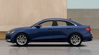 Blue A3 Saloon outside beige wall