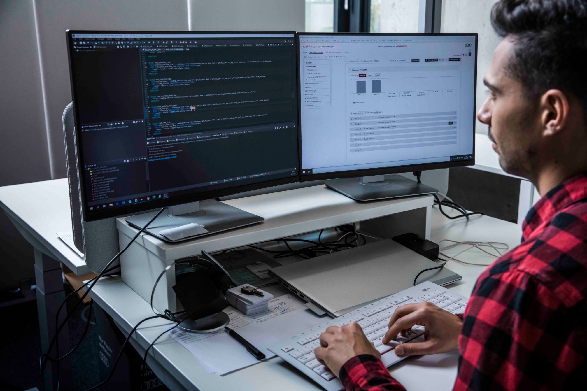SAP specialist sitting at his desk