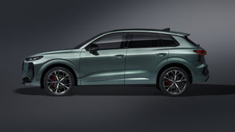 The Q3 SUV in side view.