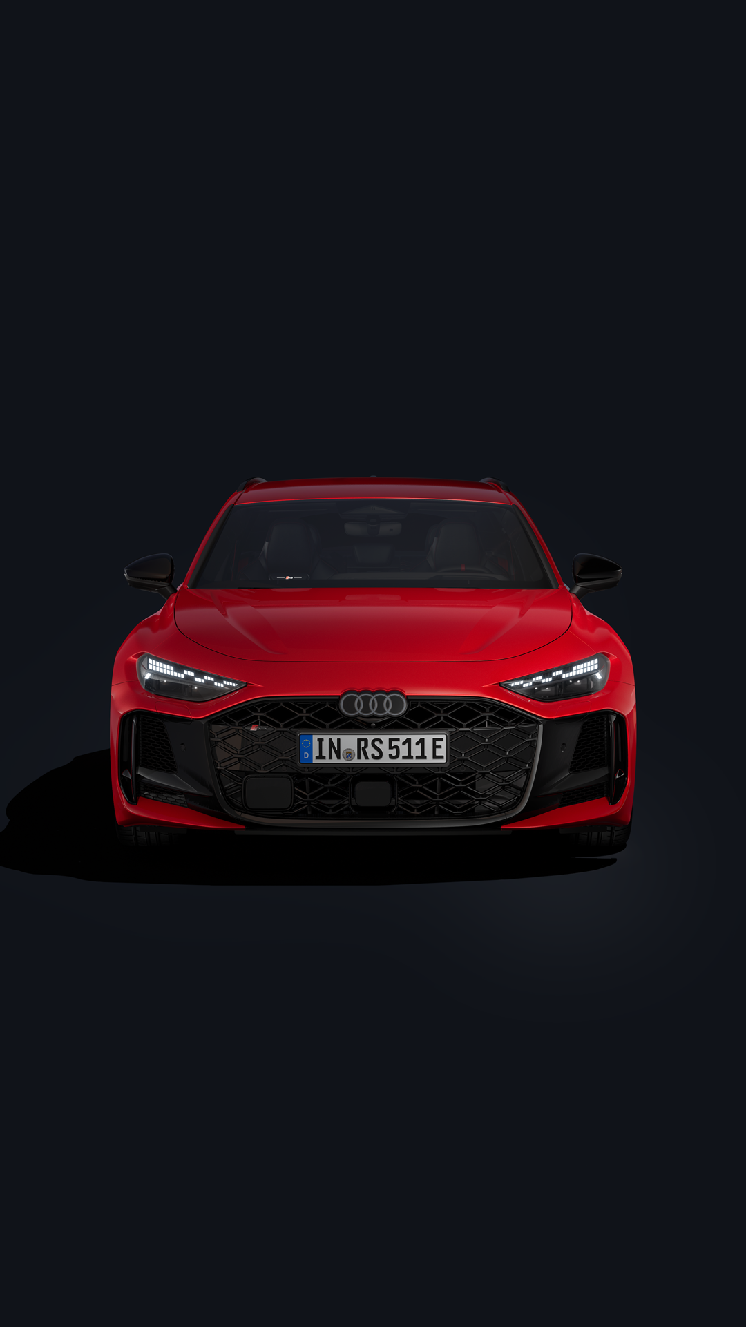 The RS 5 Avant in a slanted profile from the front on a dark background.