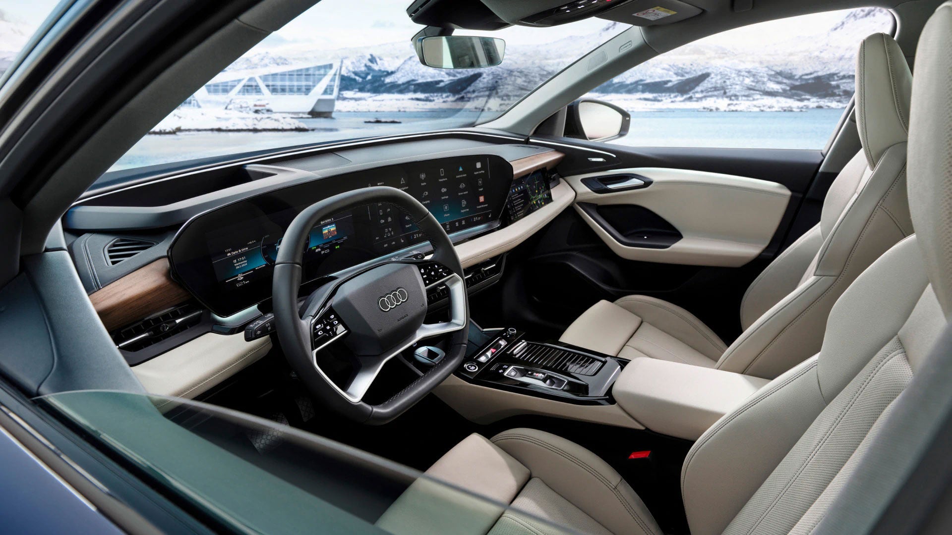 Moderner Audi-Innenraum mit digitalem Cockpit, hellen Ledersitzen und Blick auf verschneite Landschaft.