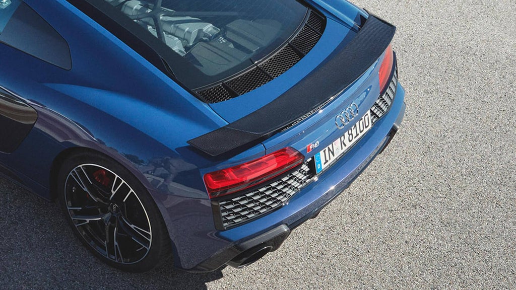 Top-down view of a blue Audi R8 Coupe showcasing its rear design.
