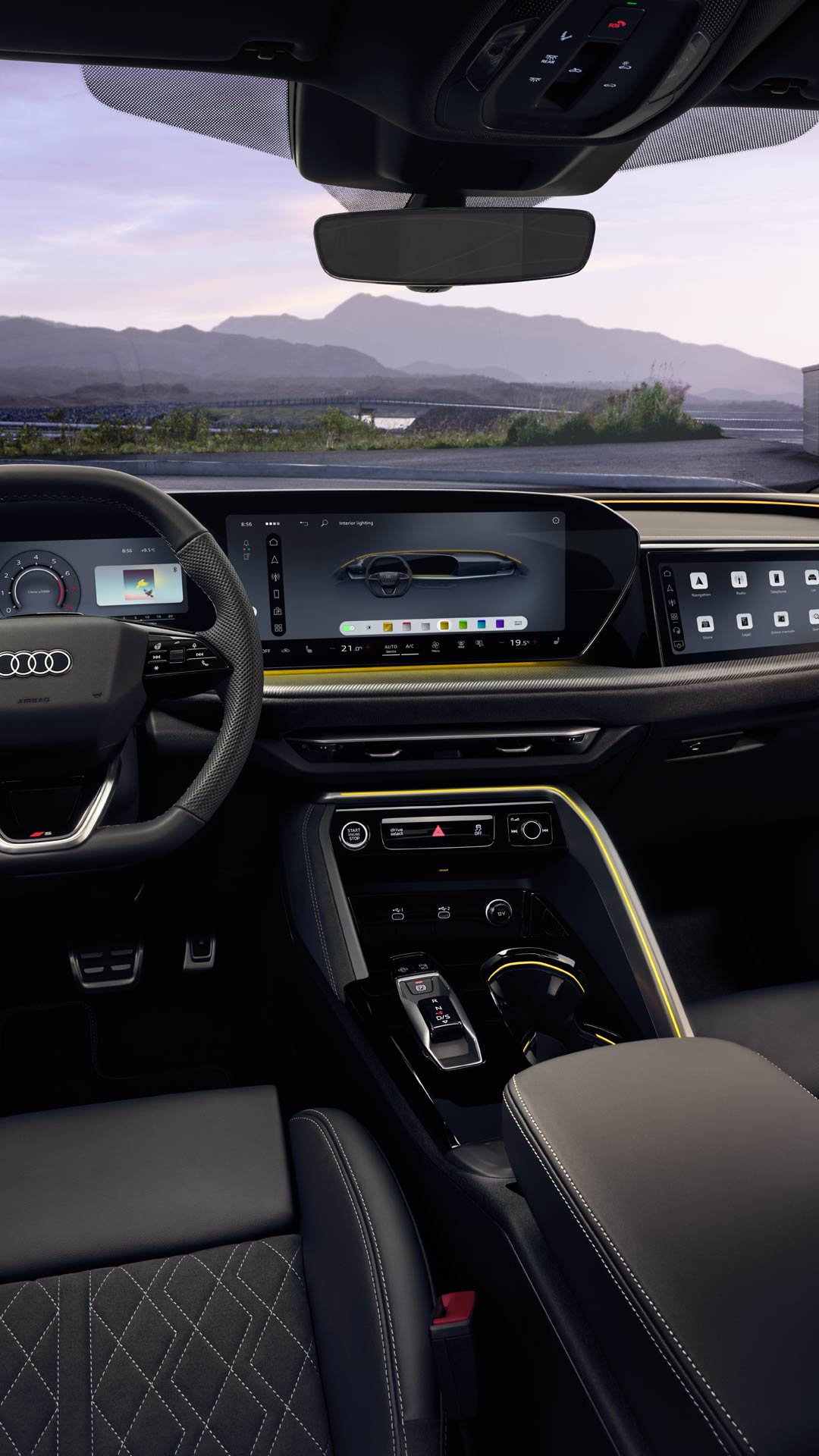 Vy över Q5 Sportbacks förarplats från förarens perspektiv. Bland annat syns MMI touch-displayen och Audi virtual cockpit bakom ratten.