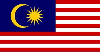 Flag of Malaysia with red and white stripes, blue field with crescent moon and star.