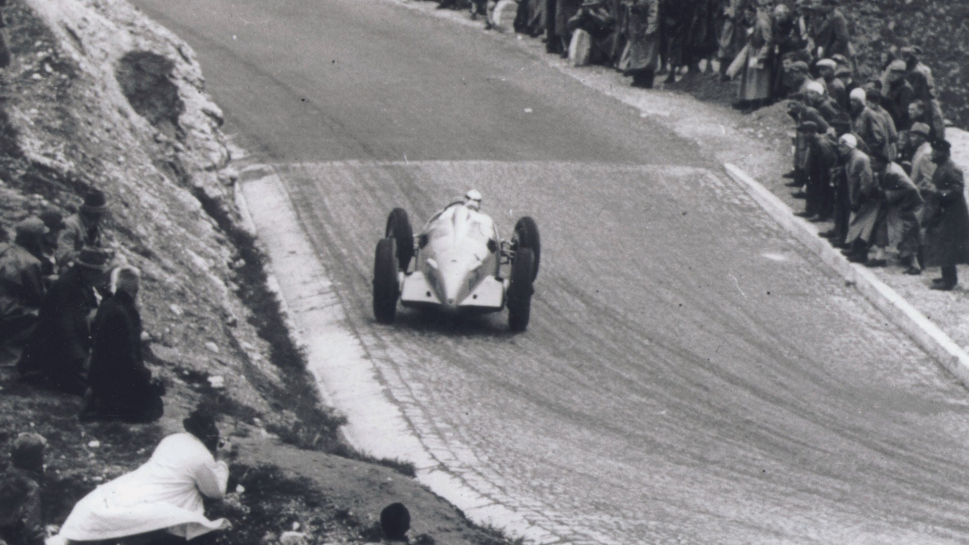 A picture of an Auto Union hill climb car in Austria in 1938.