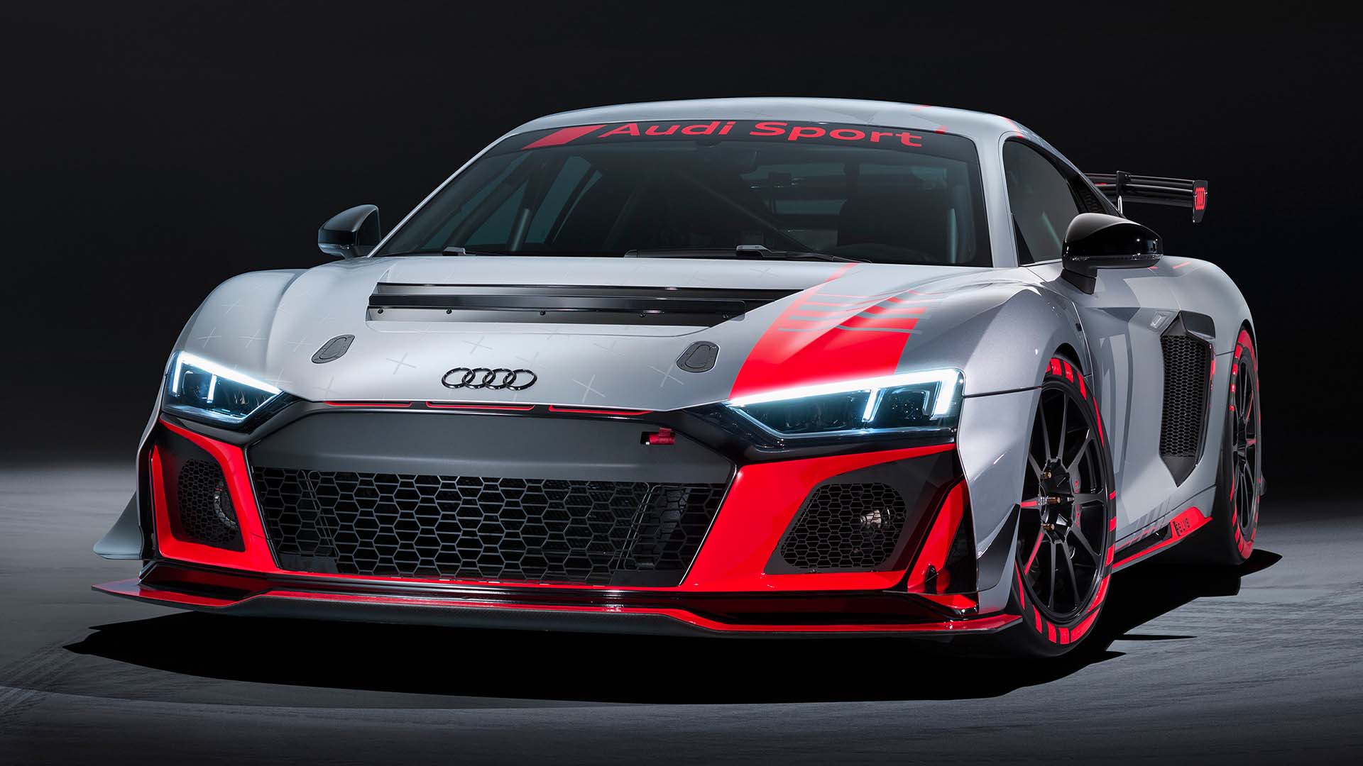 A picture showing the Audi R8 LMS GT4 race car on display.