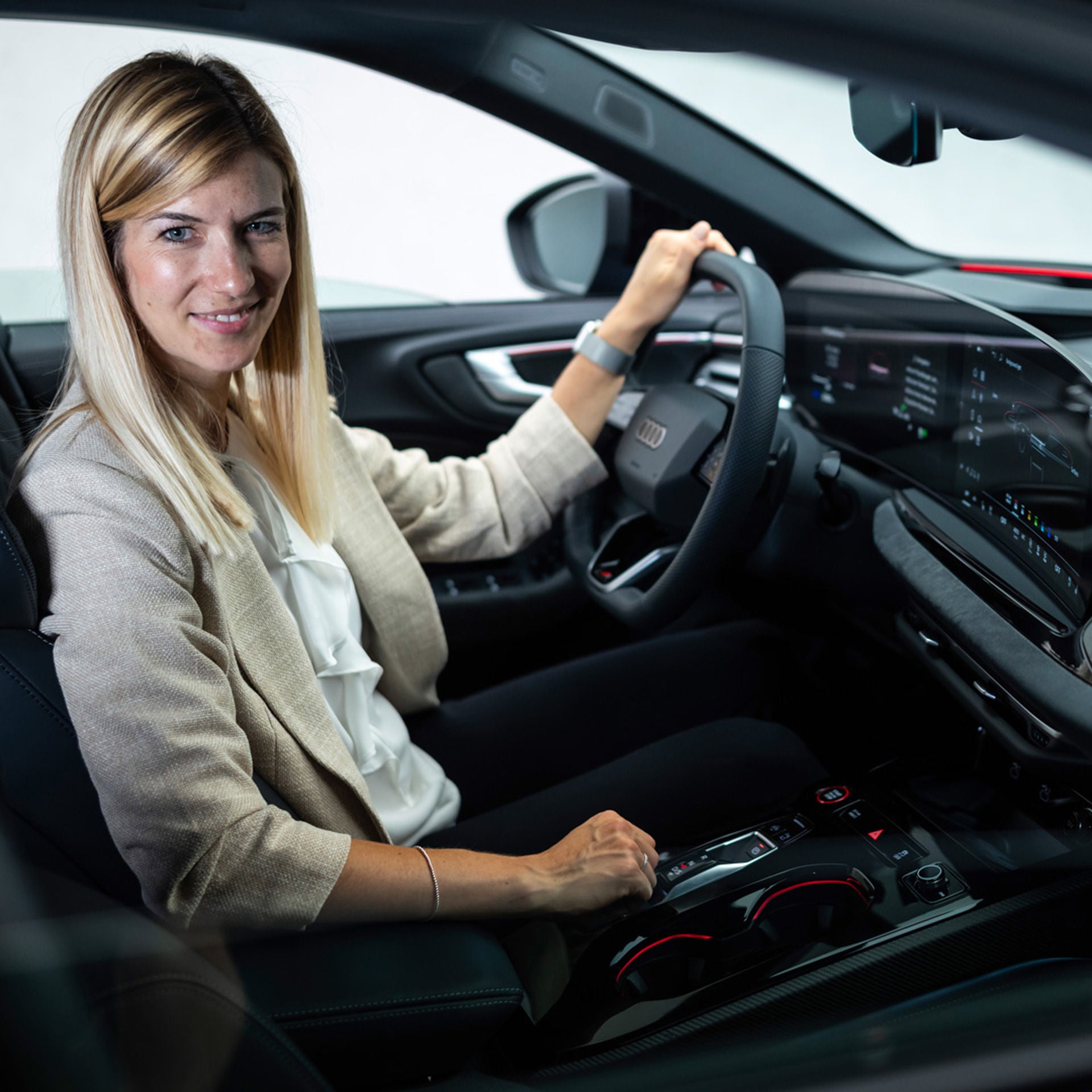 Luisa Werther sits in the new Audi A5
