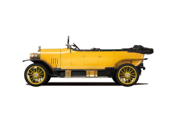 Illustration of the Audi Type C Alpine Champion in yellow against a white background