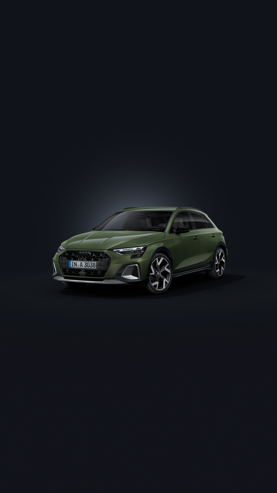 The Audi A3 allstreet, viewed from the front at an angle against a dark background.