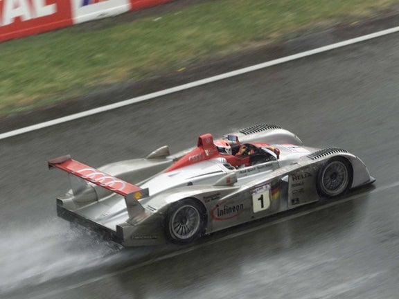 A picture showing the victorious Audi R8 in the rain at Le Mans in 2001.