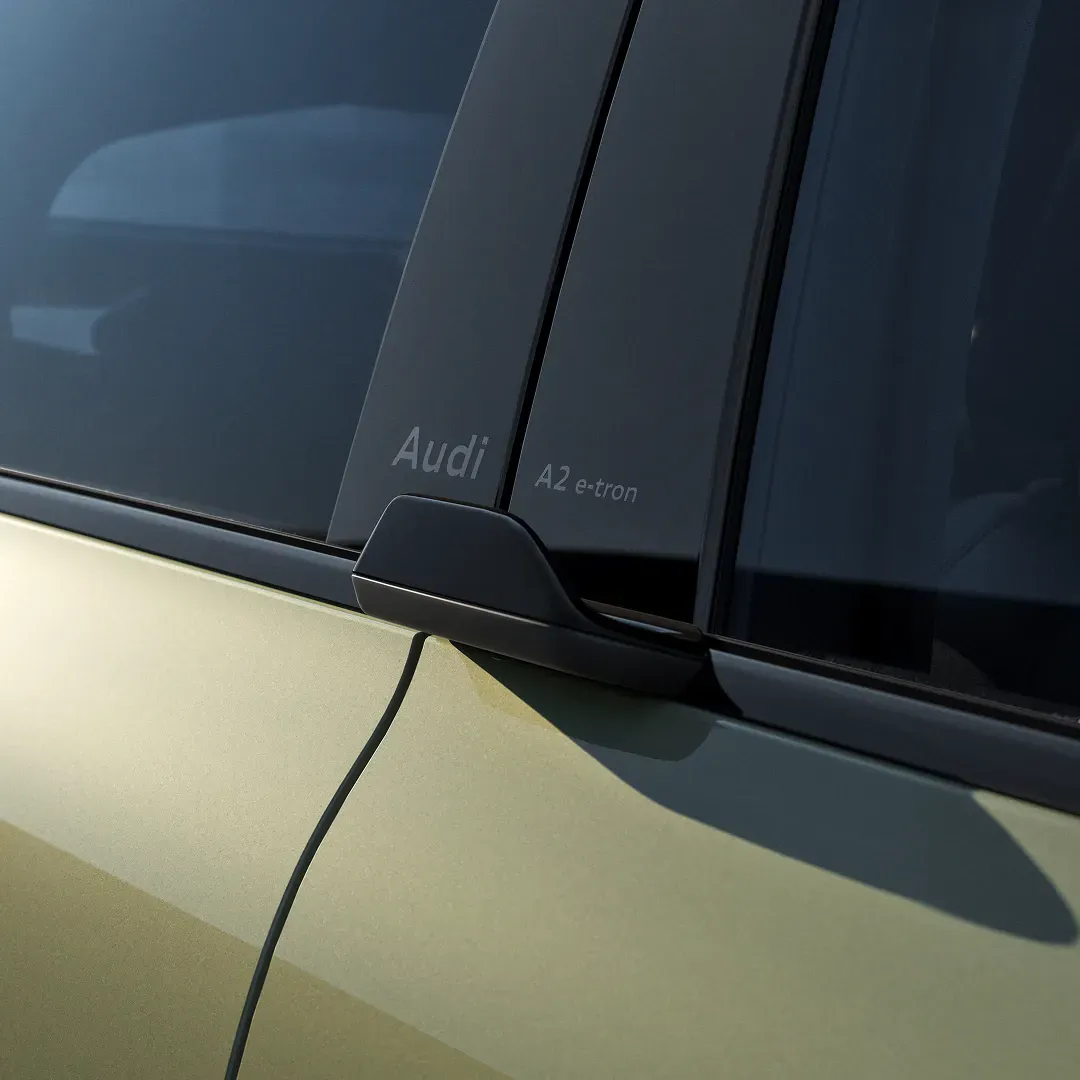 Audi A2 e-tron EV wing doorhandles with Audi branding on