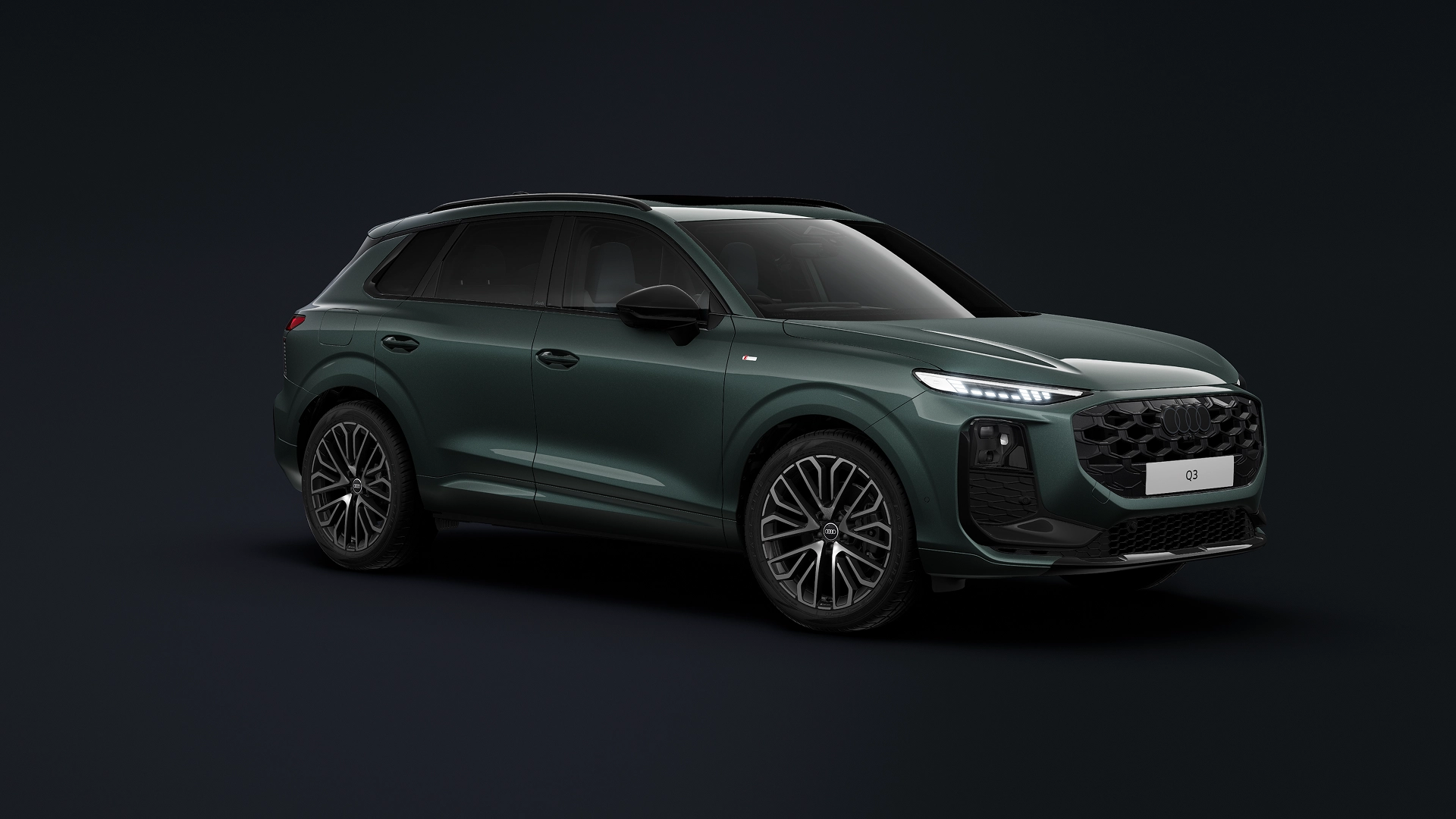 A green Audi Q3 driving on a city street, showcasing a sleek design with modern headlights and a prominent grille. The tone is dynamic and urban.