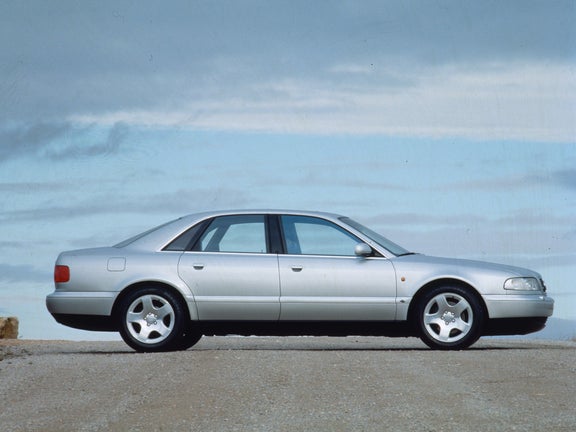 A silver Audi A8 4.2 quattro in side view from the right in front of a cloudy sky