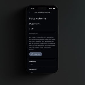 Nærbillede af en smartphone-skærm. Billedet viser et tekstafsnit om at låse op for datavolumen. 