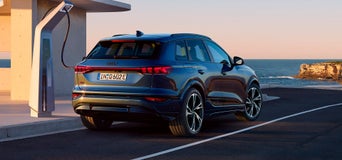 Q6 SUV e-tron tomando carga