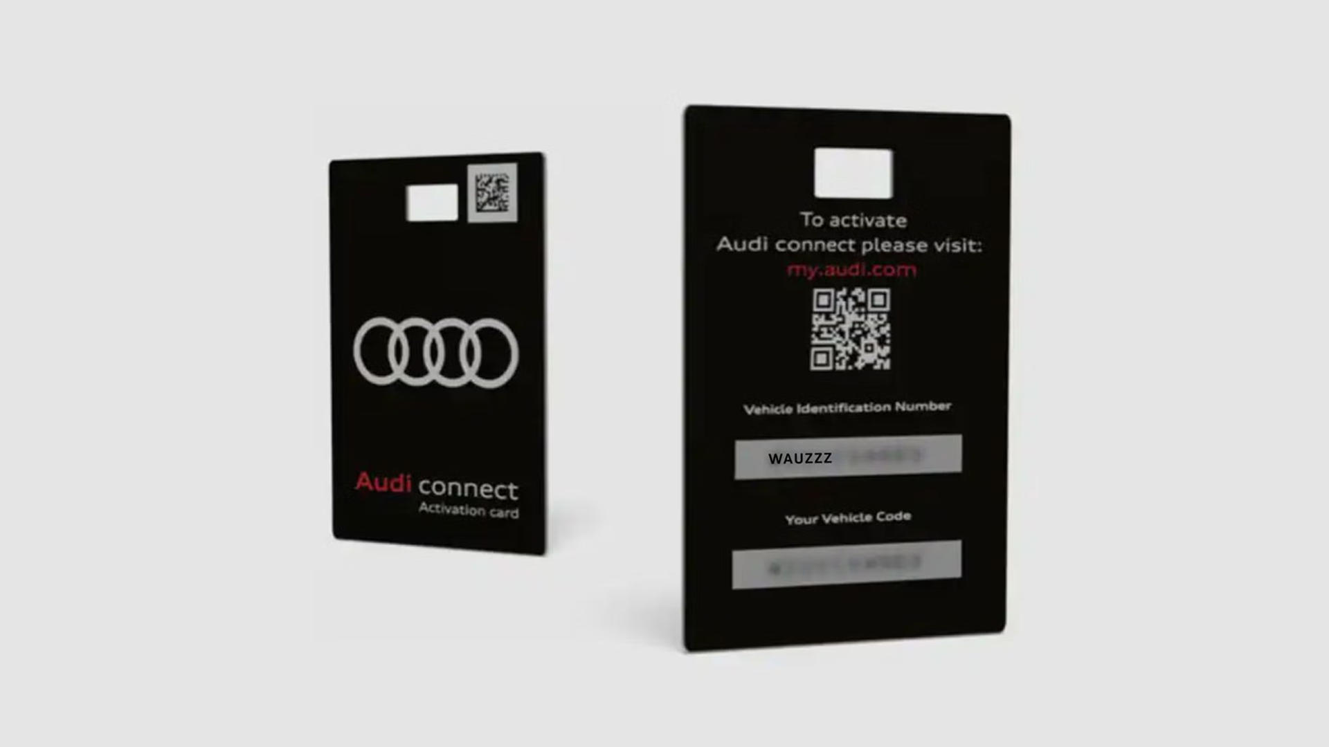 The front and back of an Audi connect activation card, the back has two number fields blurred out