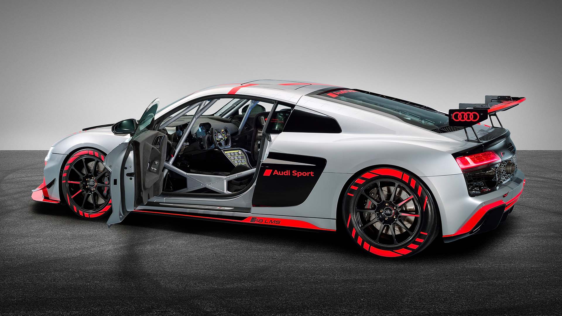 A picture showing the Audi R8 LMS GT4 race car on display.