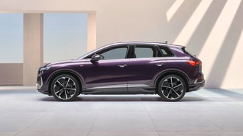 Purple Q4 e-tron outside on partial sunlit patio