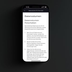 Nahaufnahme eines Smartphone-Displays. Abgebildet ist ein Textparagraph über das Freischalten von Datenvolumen.