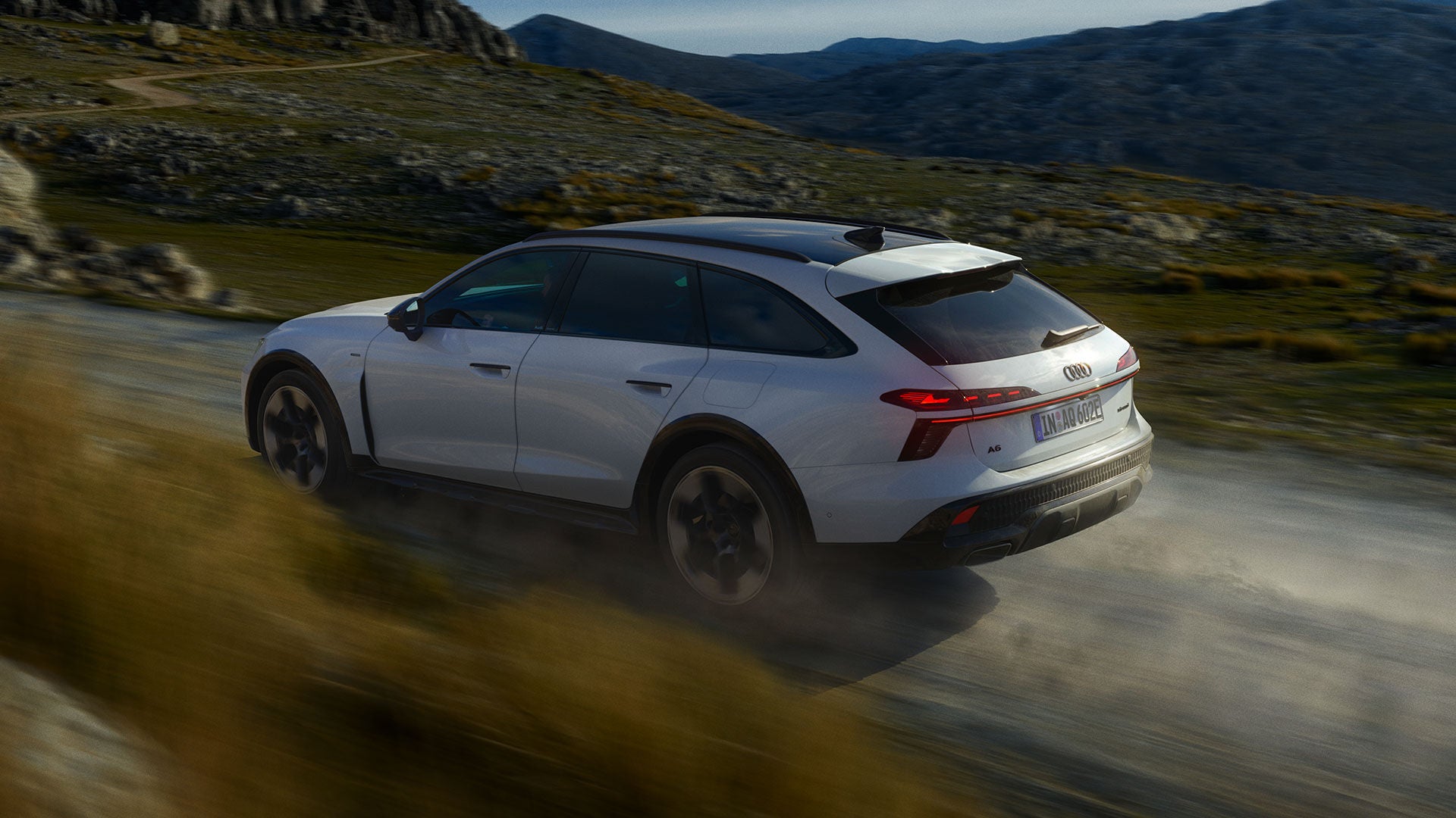 A6 allroad e-hybrid driving through hills