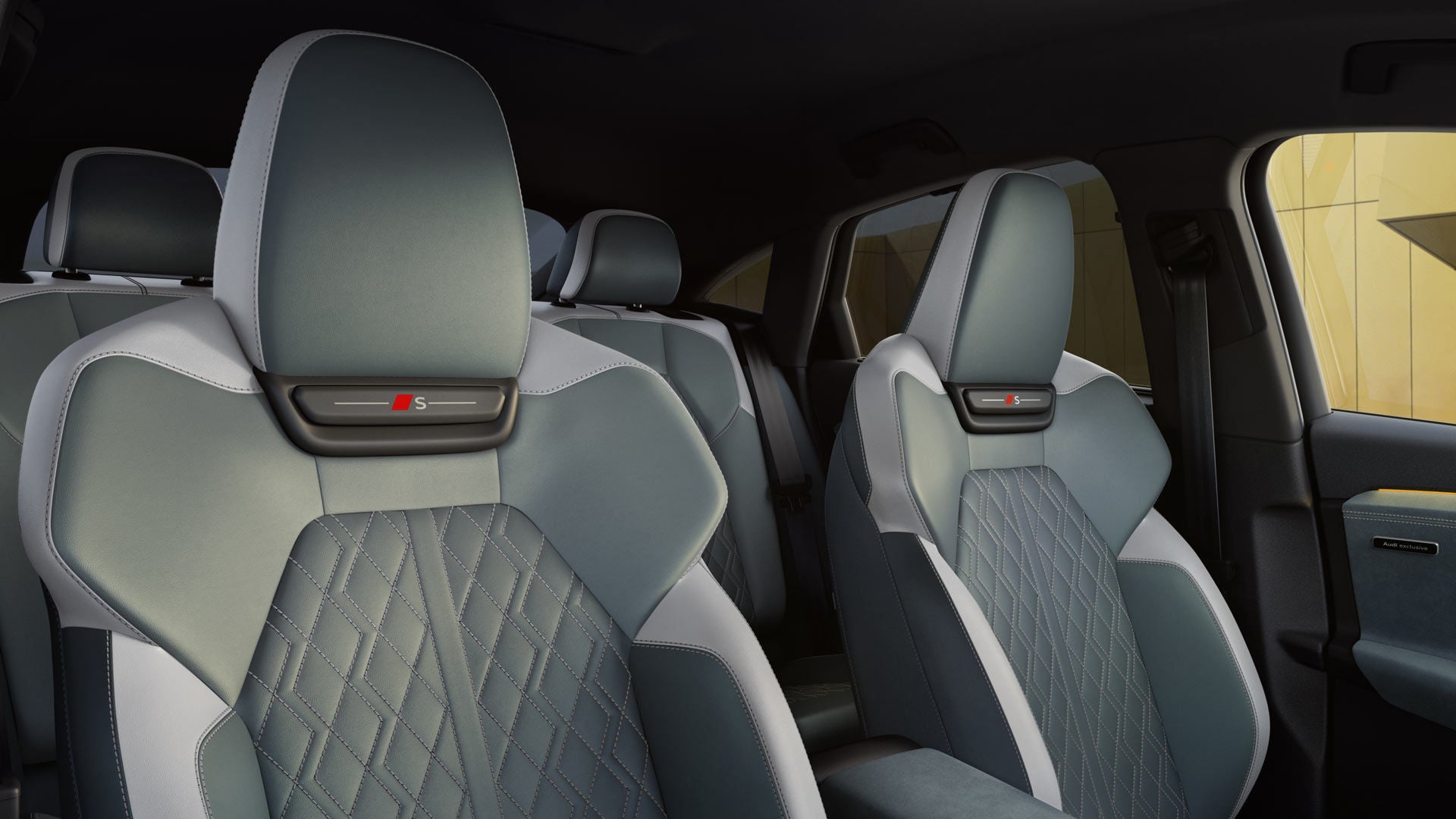 The front interior of the SQ6 Sportback e-tron as seen from the passenger window. The seat covers are in mint grey Audi exclusive fine Nappa leather with contrasting stitching in diamond silver.