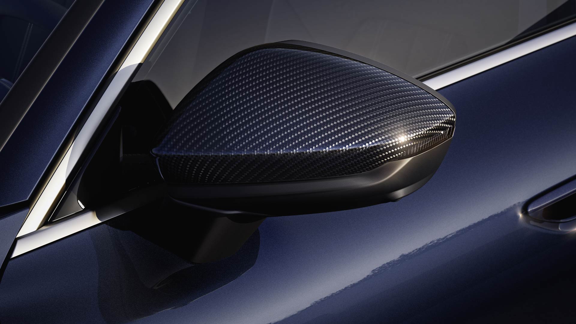 Foto de un retrovisor exterior de los Accesorios Originales Audi del Audi A6. 