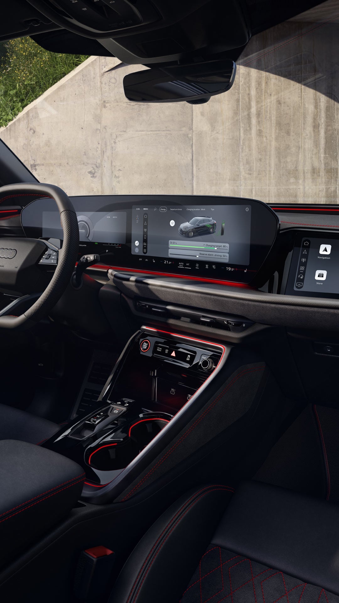 Interiören i Q5 Sportback e-hybrid med fokus på cockpit och ratt.