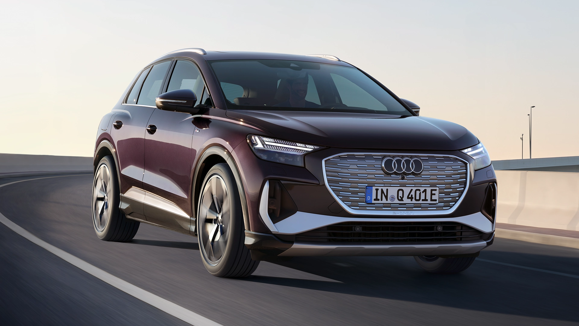 Image of purple Audi Q4 SUV e-tron on a road
