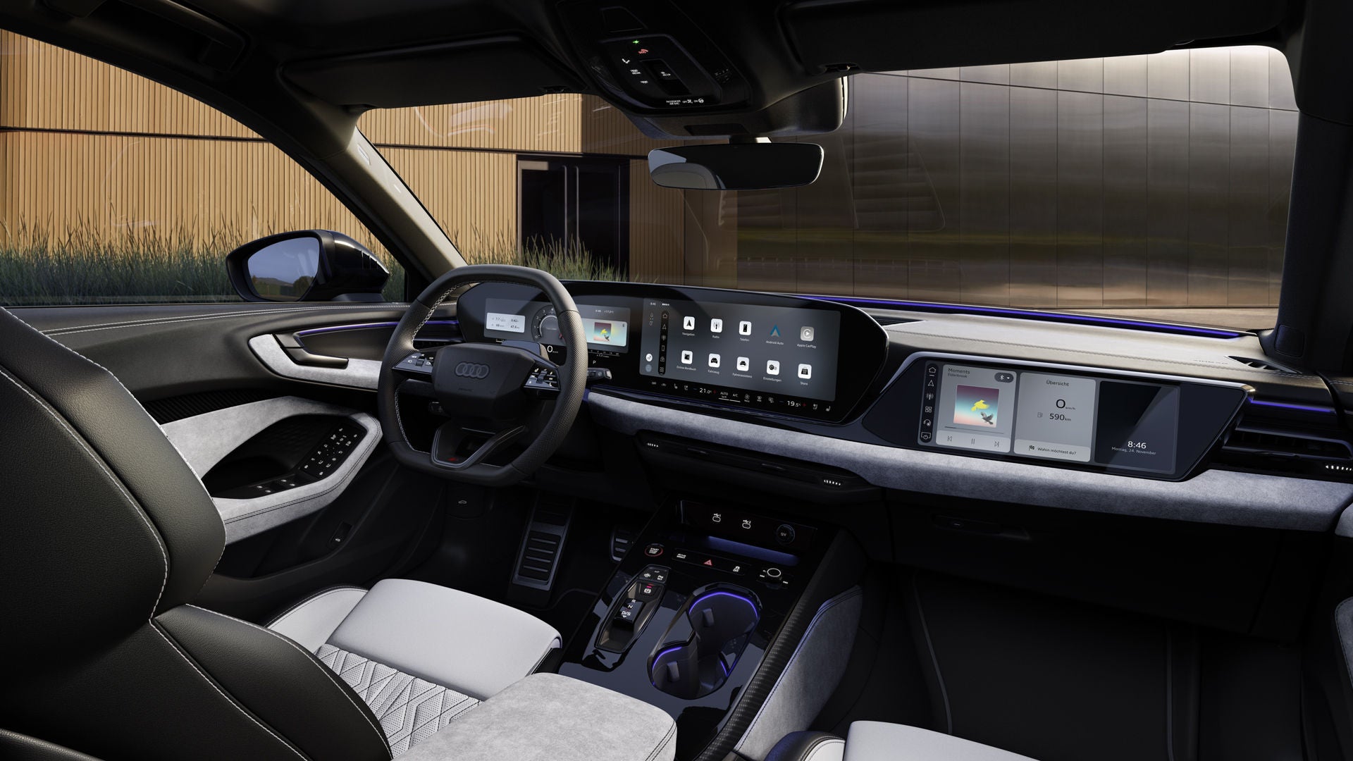 Innenraum und Cockpit des S5 Avant aus Beifahrerperspektive. Der Innenraum leuchtet in lilanem Ambiente Licht.