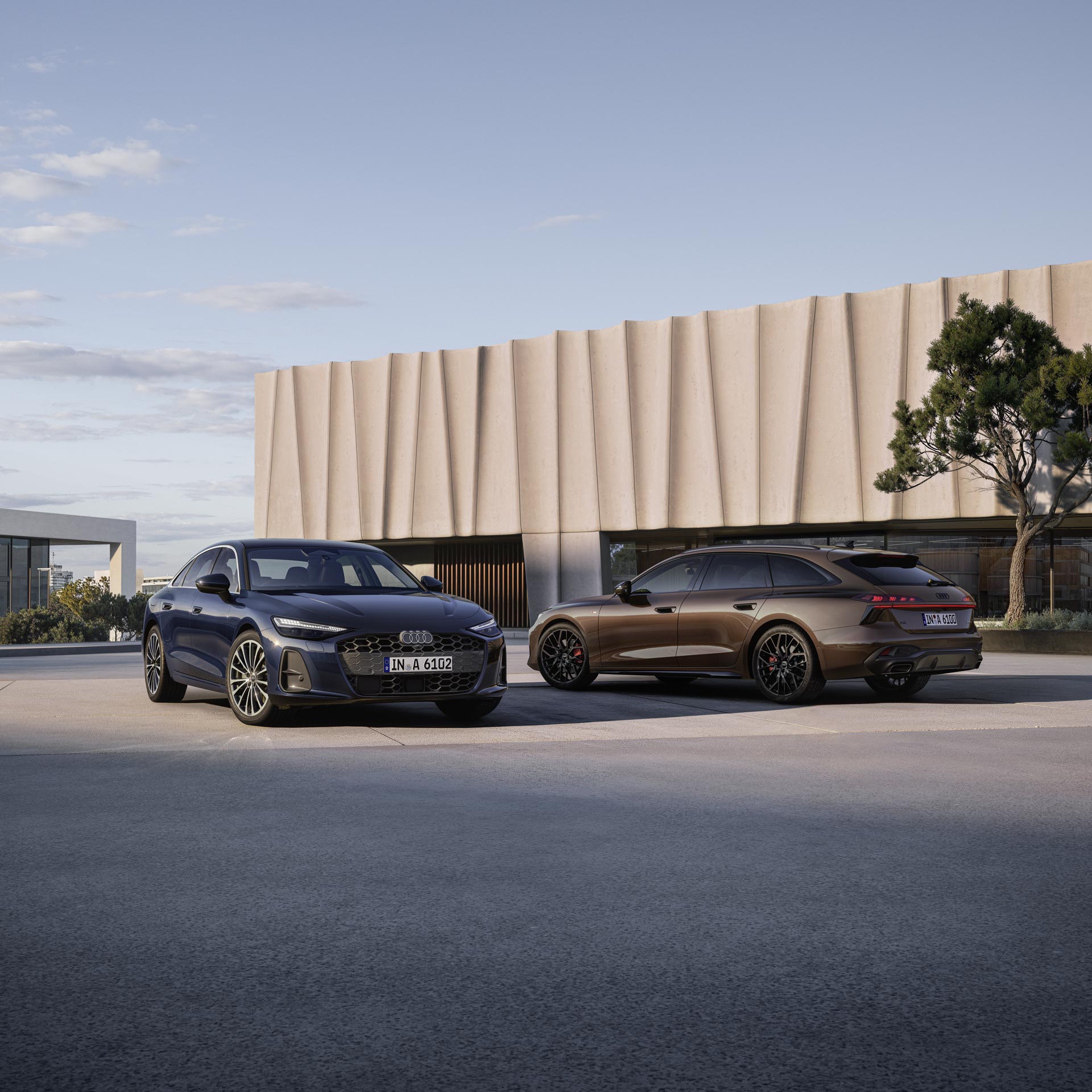 Close up of an Audi car seat, featuring the RS logo and red stiches