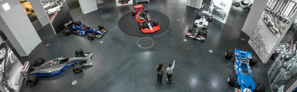 Audi race cars at the historic dealership