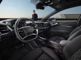 Illustration of an Audi vehicle in blue colour on a black background