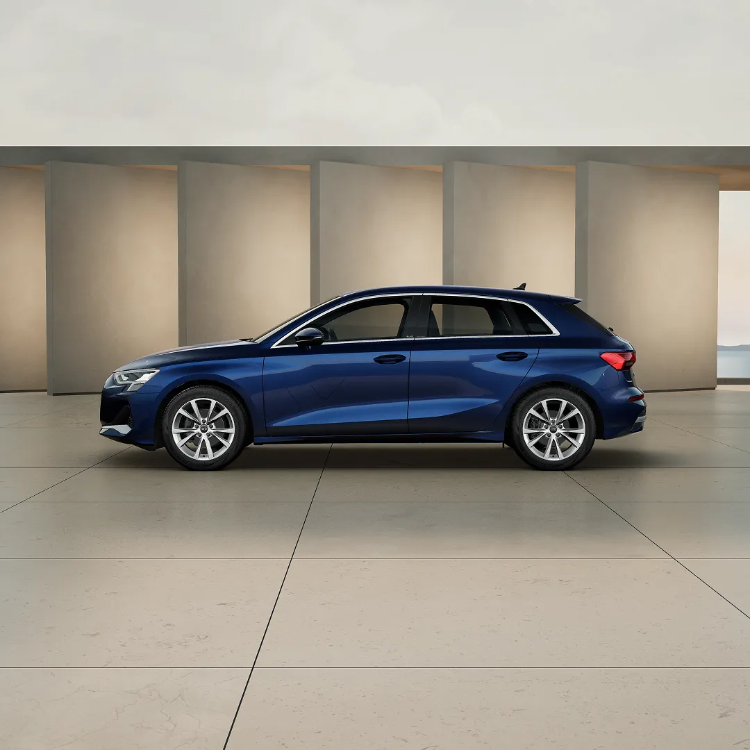 White A3 sportback next to beige wall