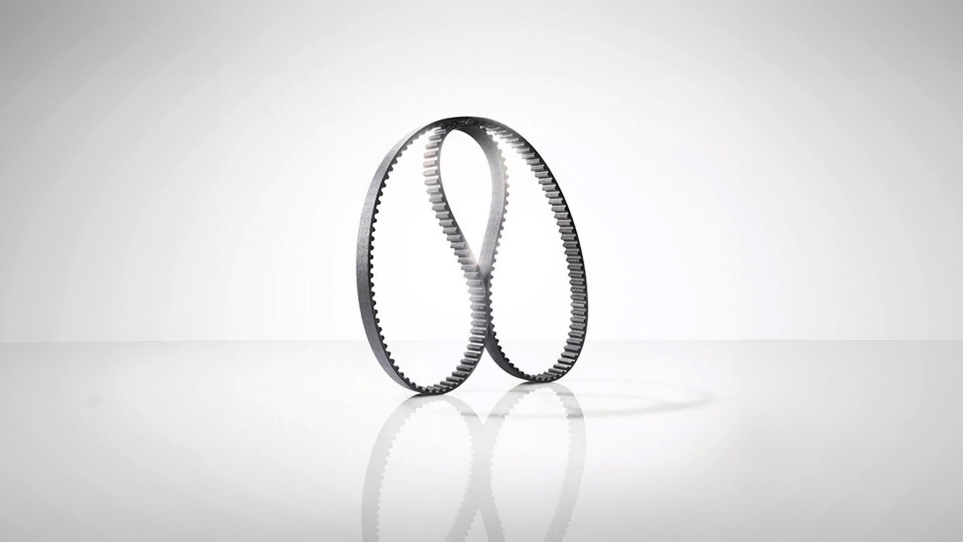 Foto de un cambio de correa de distribución de un Audi.