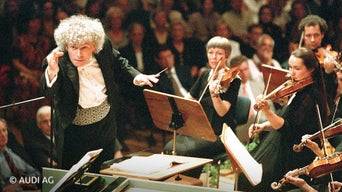 Mann dirigiert Orchester