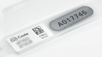 Close up of the key user tag, which is blurred out, on an Audi vehicle