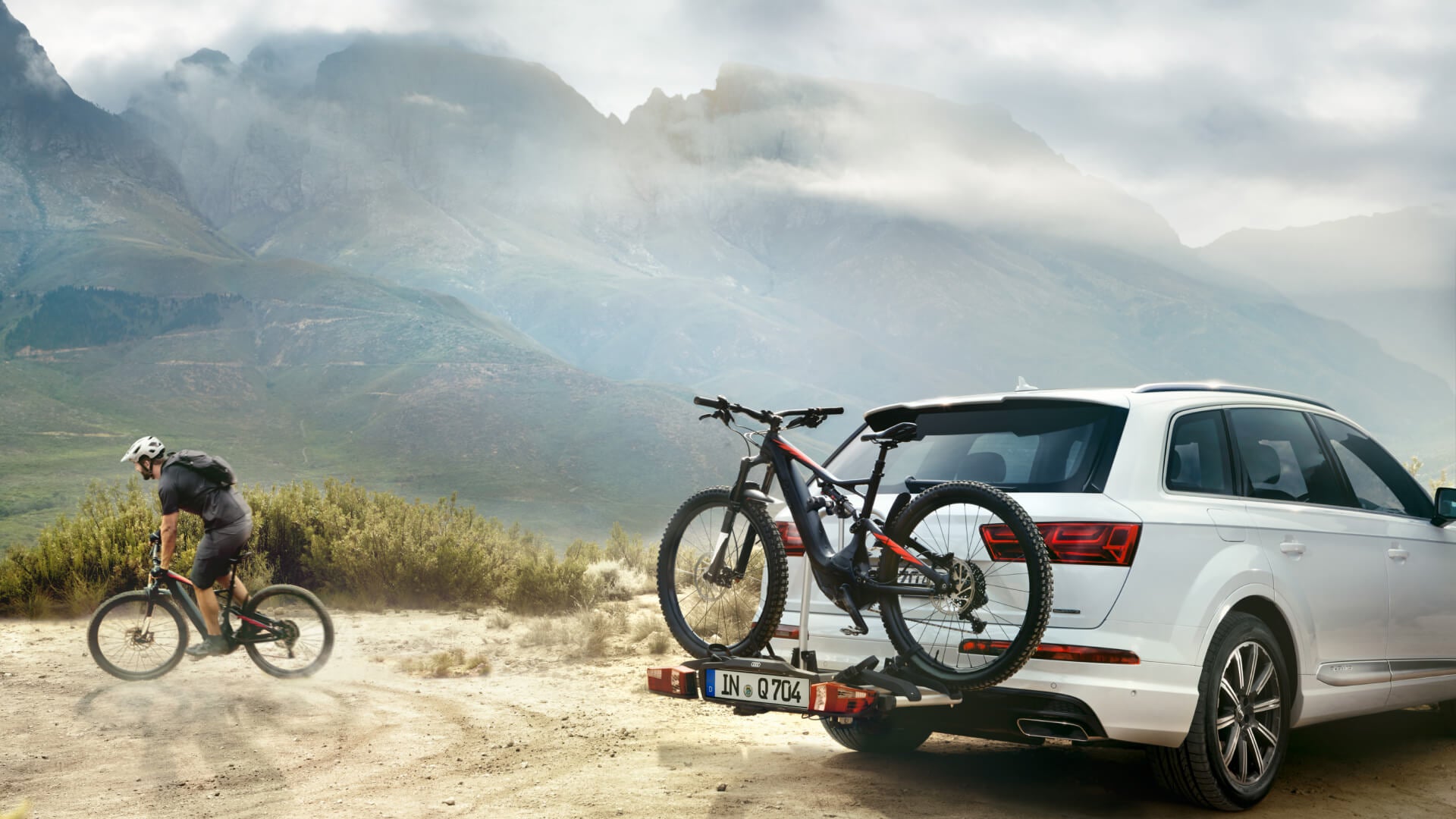 A parked Audi vehicle in a sunny location