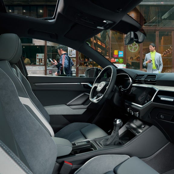 Audi Q3 Sportback inside interior passenger view of cockpit.